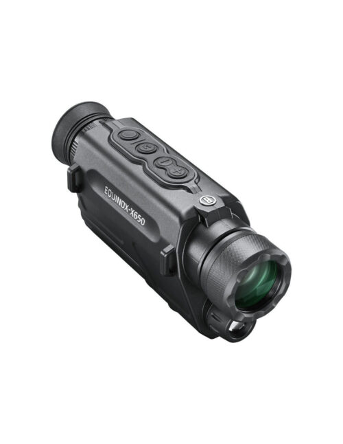 Monocular Bushnell Equinox X650 5x32 sobre fondo natural, demostrando su capacidad para la visión nocturna y diurna